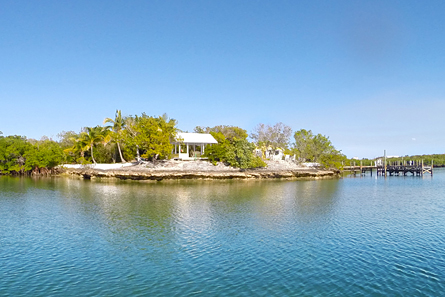 The Harbour Cottage sits on an outcropping of limestone on Black Sound.