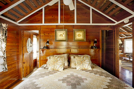 The front bedroom features a comfortable king bed and ceiling fan!