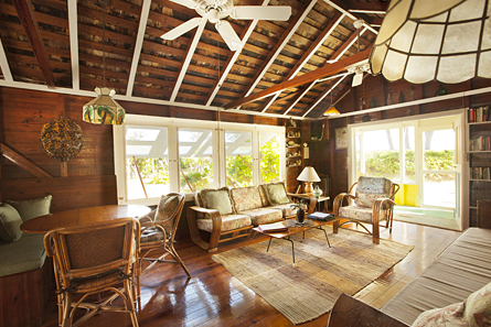 Main living area and sitting room with round table for dining.