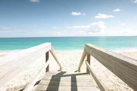 Wooden stairs put the beautiful beach at your doorstep.