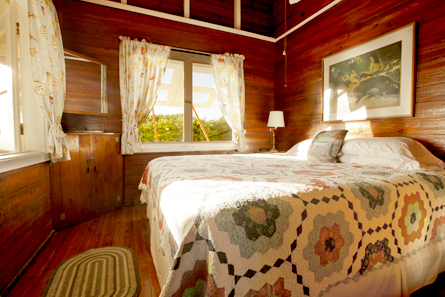 Front bedroom with king-size bed and view of the Atlantic Ocean.