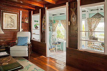 Living space is connects to bright, cheerful porch dining area.